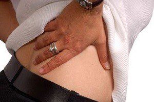 Почему болит с права внизу спина