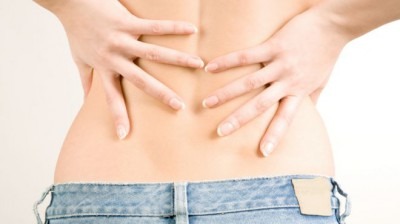 Болит внизу спина у женщины